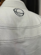 raine branded white bjj bamboo gi
