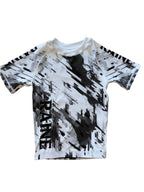 A black and white camouflage pattern kids rashguard.