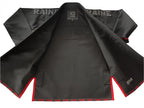 A black competition gi with red lining on a white background
