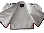 A white competition gi with red lining on a white background
