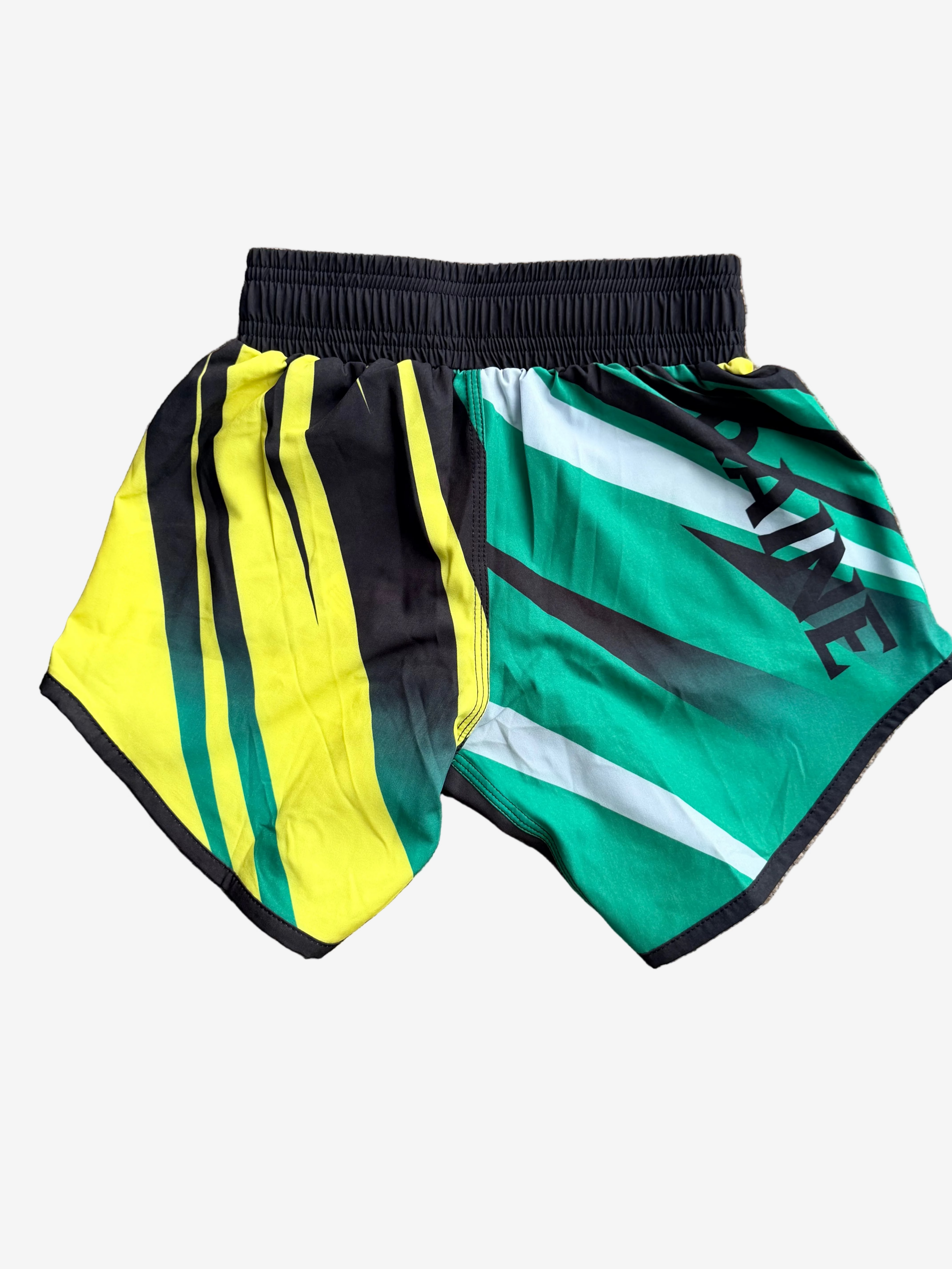 Colorful shorts with black, yellow, and green patterns 