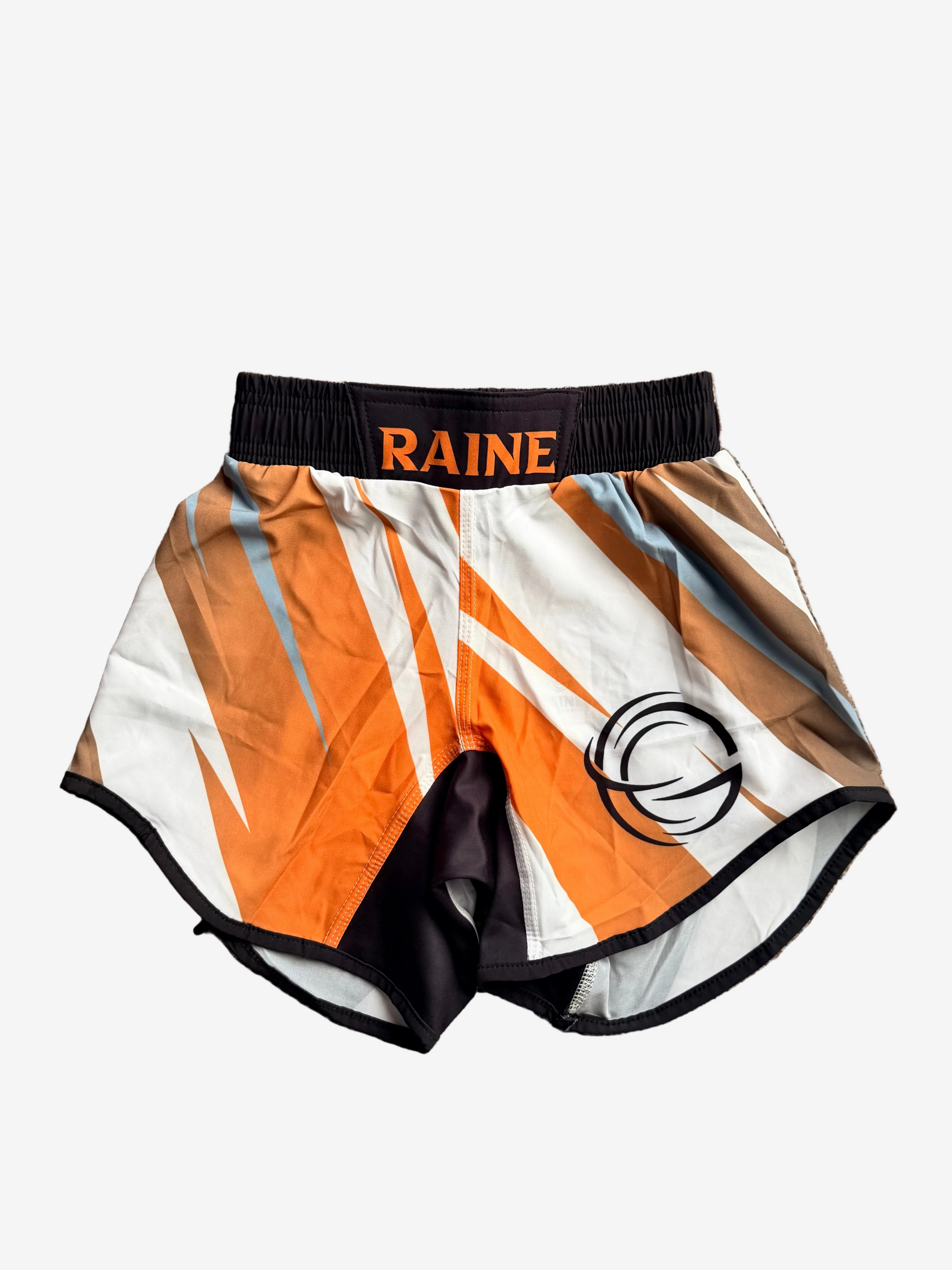 Orange and white athletic shorts with a black waistband and logo 