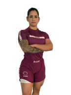 athlete wearing a burgundy nogi outfit with 'Raine' branding on a white background