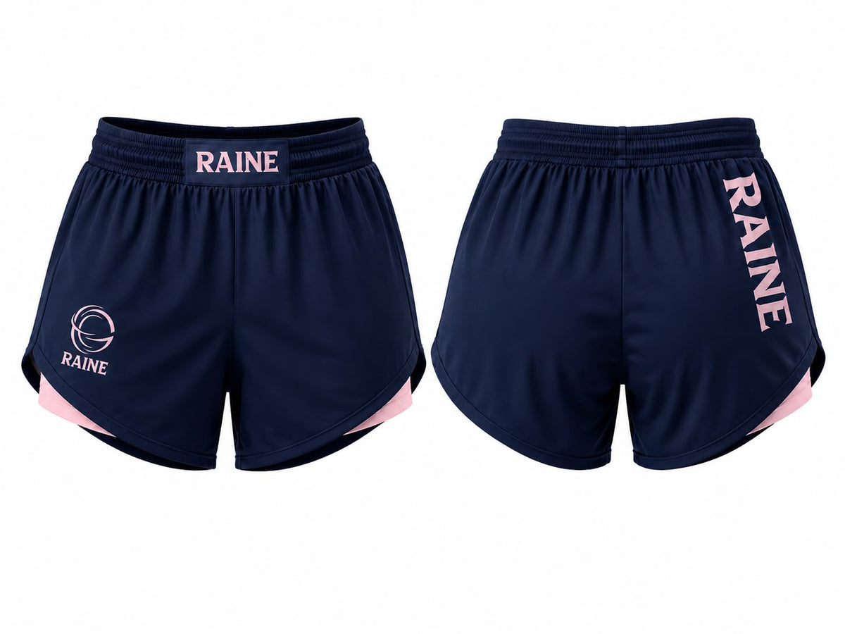 Front and back views of navy blue athletic shorts with pink accents and 'RAINE' branding, displayed on a solid white background.