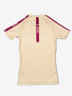 ivory rashguard  with burgundy raine branding accents 