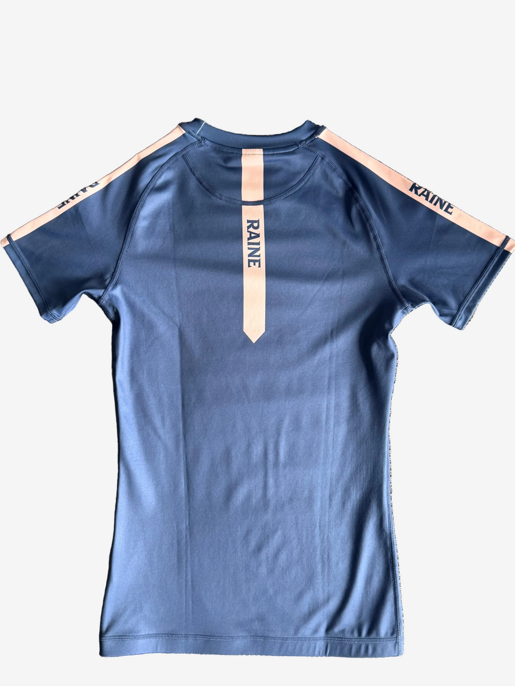 navy rashguard with 'RAINE' branding guard