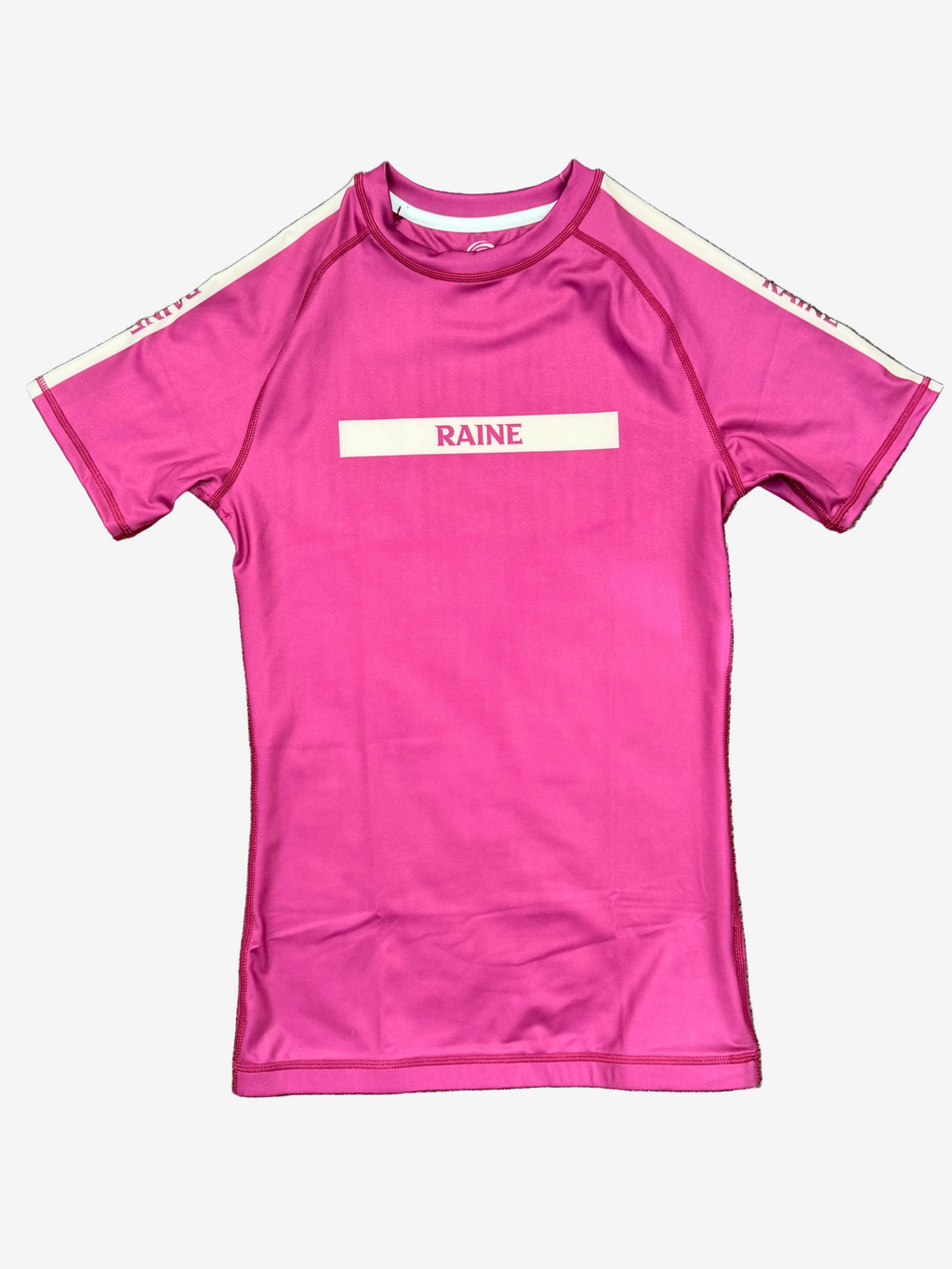 burgundy  rashguard with 'RAINE' logo 