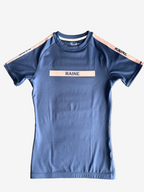 navy rashguard with 'RAINE' branding 