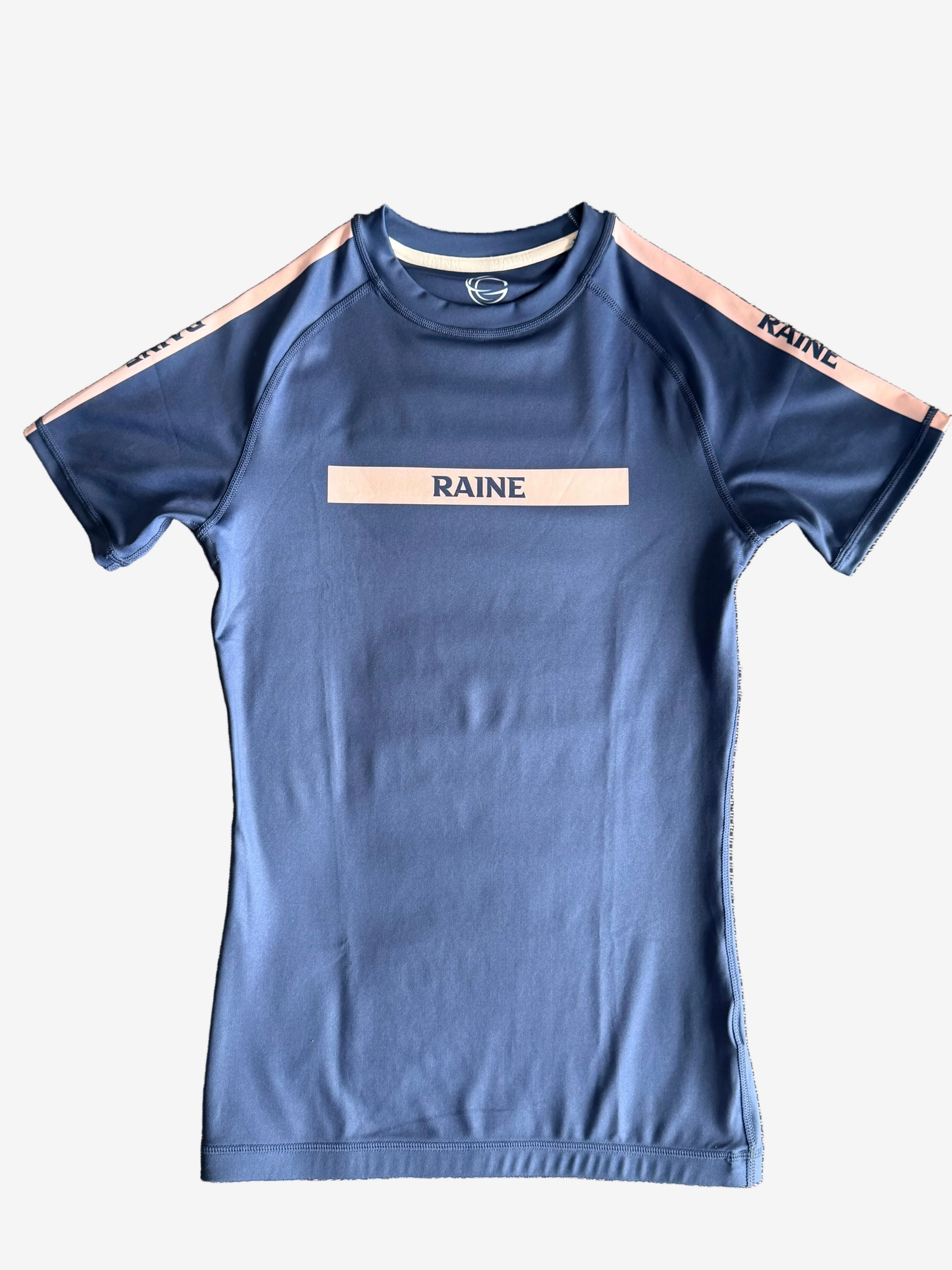 navy rashguard with 'RAINE' branding 