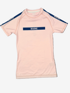 Pink short-sleeve rashguard with 'RAINE' branding