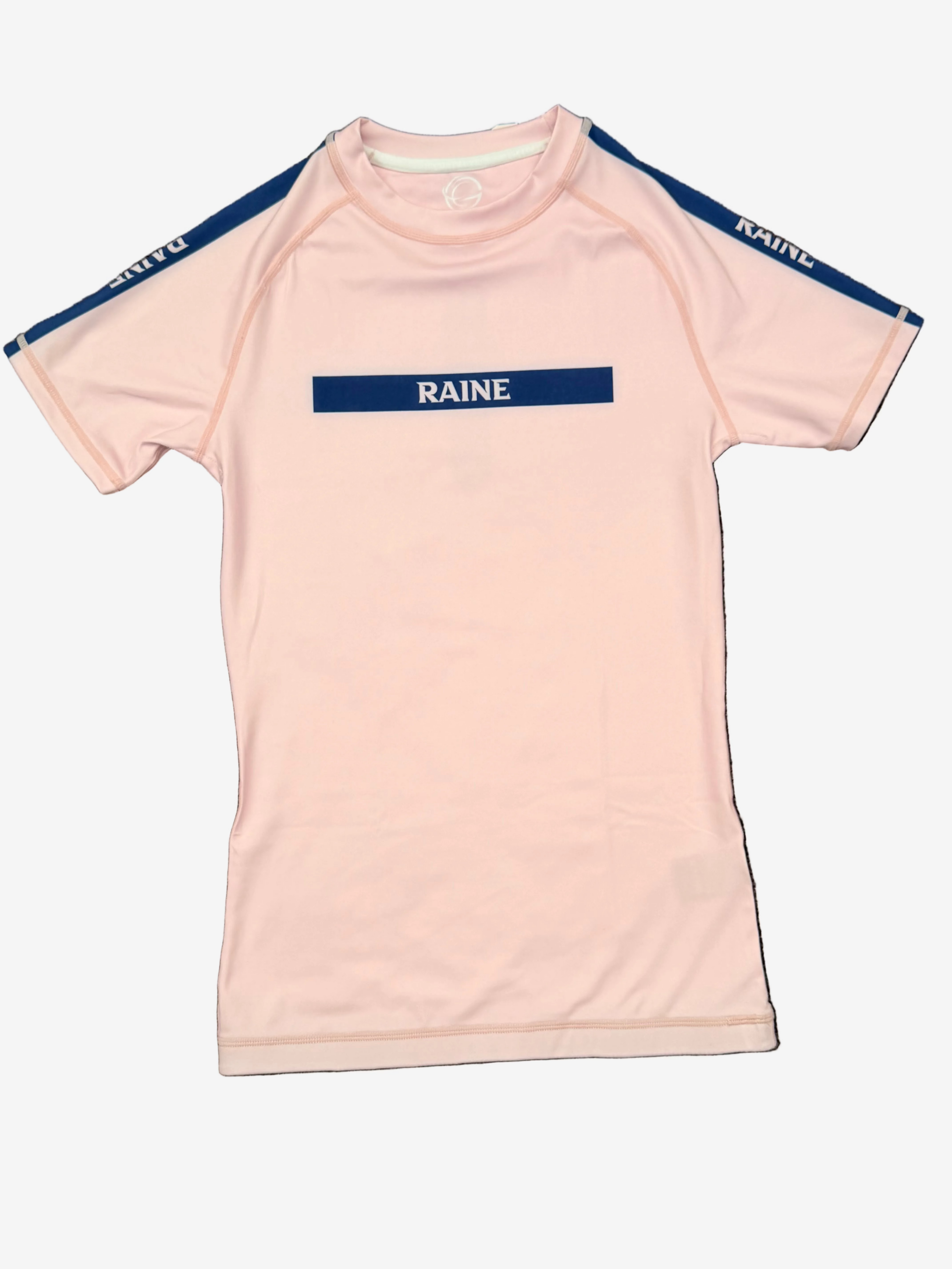 Pink short-sleeve rashguard with 'RAINE' branding